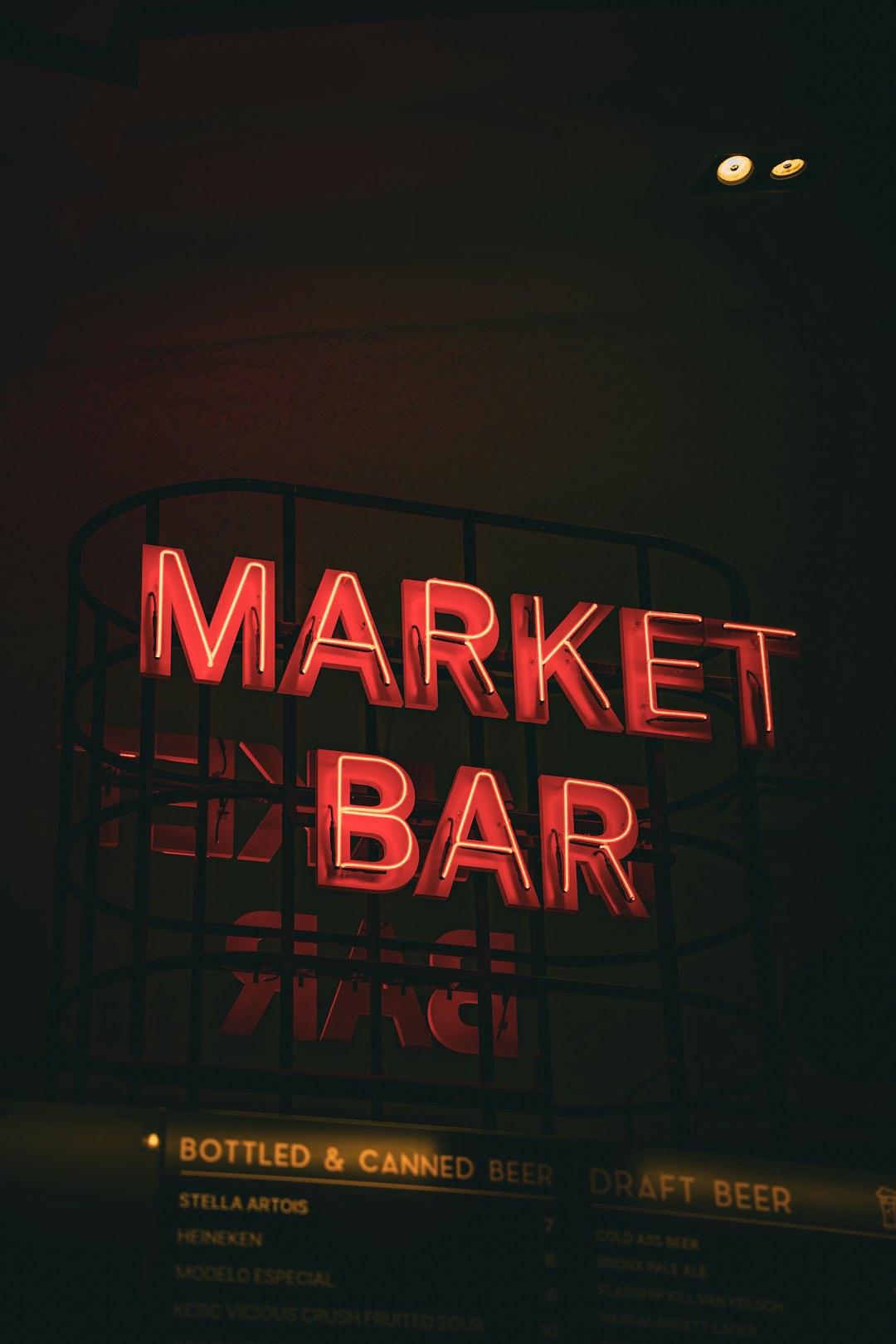 a-neon-sign-that-reads-market-bar-groupxzznte